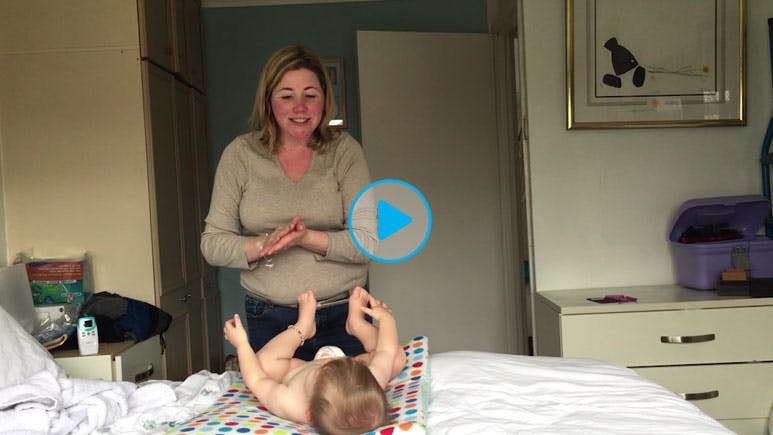 mum and baby - video play button